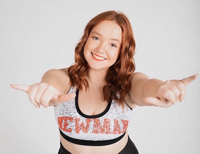 Johnson is a member of the Newman University cheer and dance team