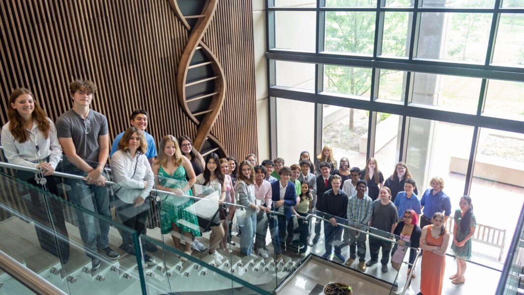 Campers of the Investigative Summer STEM Program gather for a group photo on the staircase of the Bishop Gerber Science Center at Newman University.