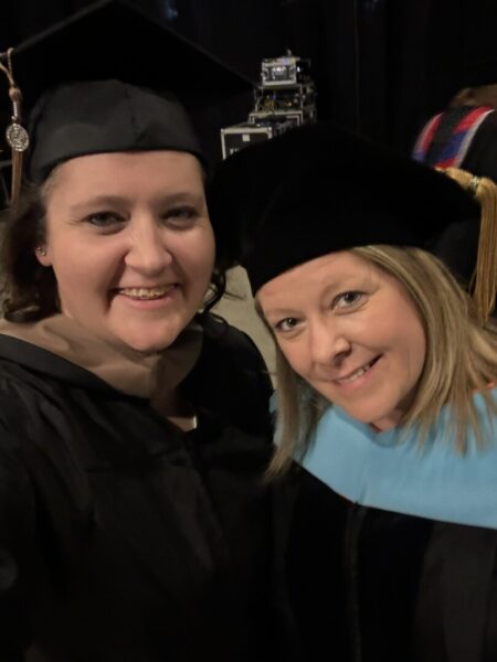 Webster and Bird at Newman University commencement May 10.