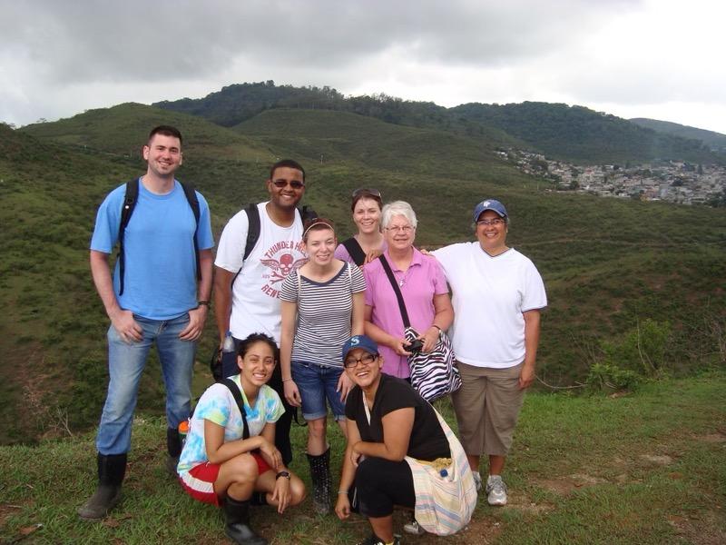 Ralls (left) on his first trip to Guatemala with Sister Marsha Wilson, ASC, (in pink) and fellow Newman students.