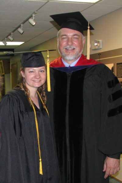 Amanda Stanley '08 with her late father, Douglas L. Stanley, at her graduation from Newman.