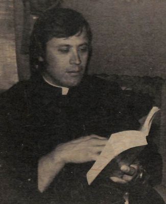 Welk reads from the Bible at Newman University in the 1970s.