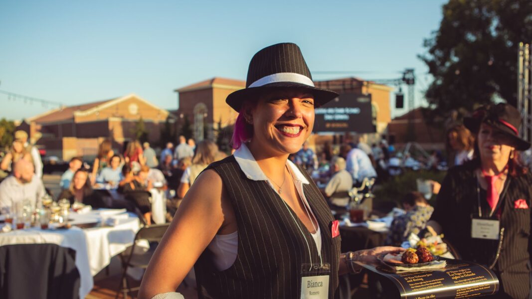 Staff member Bianca Romero dressed to the nines for the Roaring 20's theme.