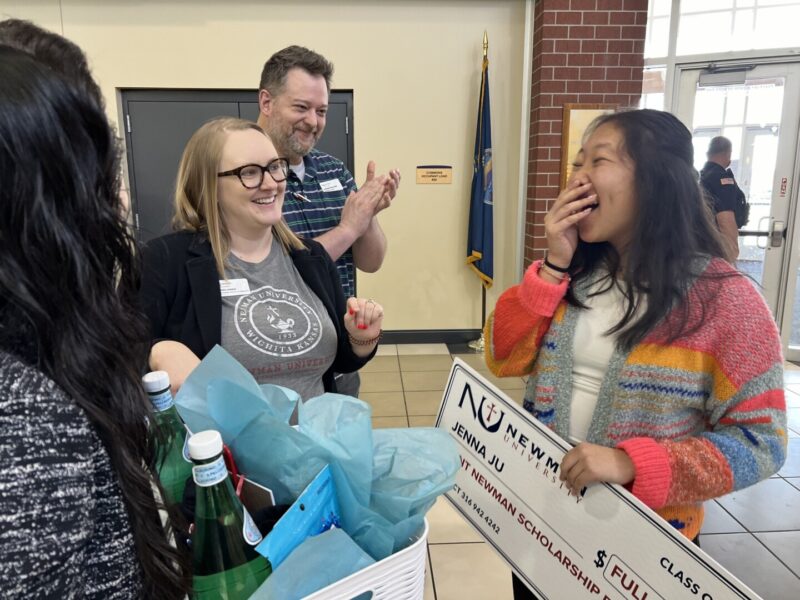 Ju's reaction was one of gratitude when Senior Associate Director of Admissions Georgia Drewes surprised Ju at her high school.