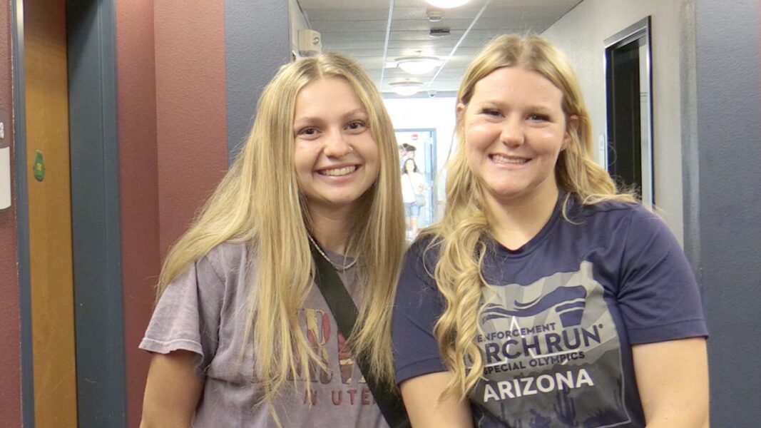 (From left to right) Roommates Nordby and Westover are all smiles during move-in day, their first day on Newman University's campus.