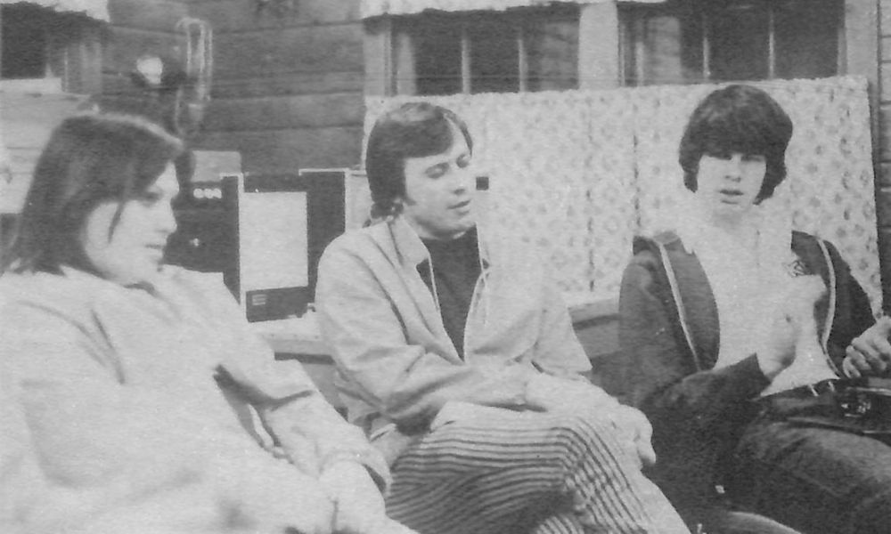 Welk (center) with students at Kansas Newman College in the 1970s, now known as Newman University.