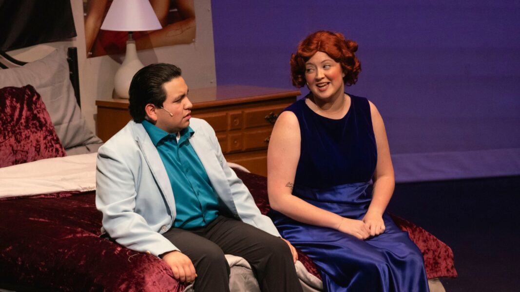 Crabb and student Nathan Galicia sit and talk in "The Wedding Singer"