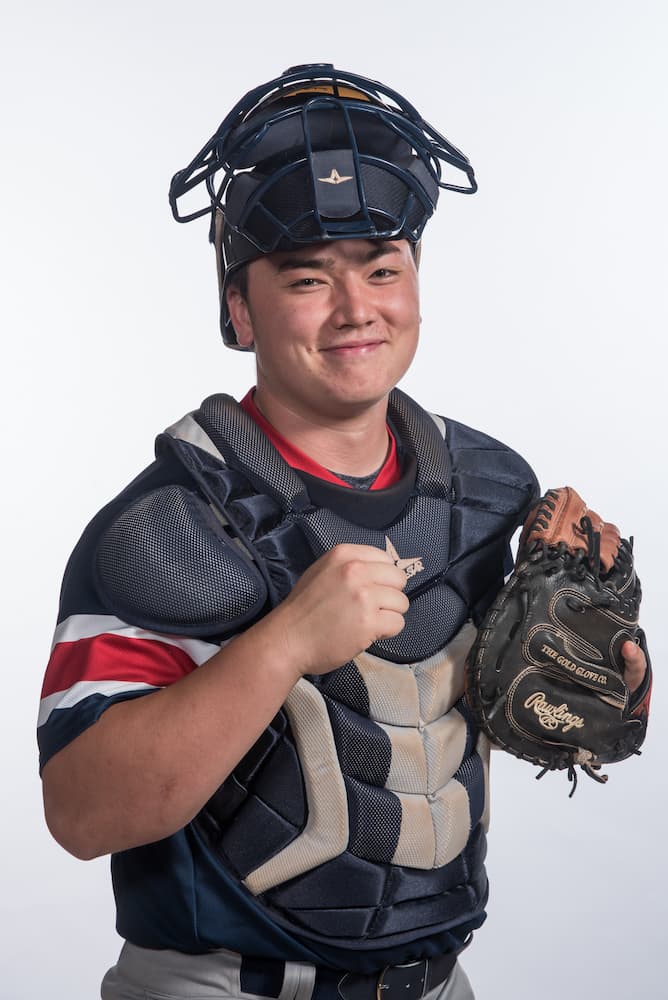 Nguyen wears his goaltender attire as part of the Newman men's baseball team when he was a student. 