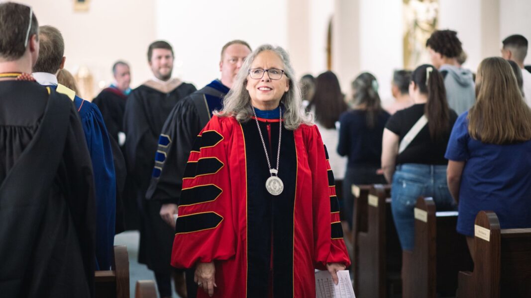 President Jagger leads the procession out of the chapel following Mass.