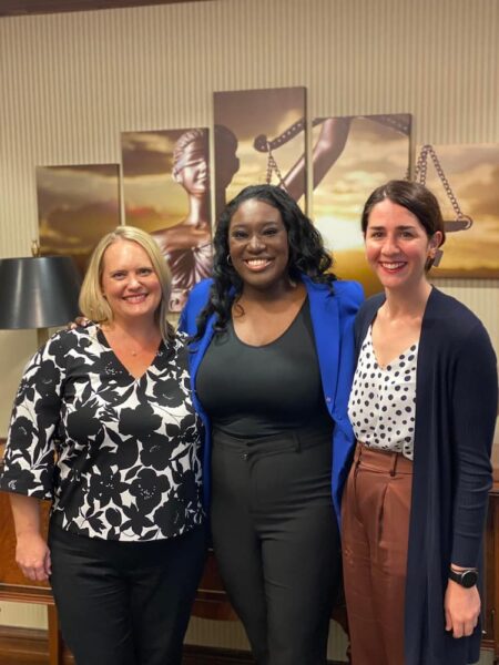 (From left to right) Martin Pringle attorneys Michelle Moe Witte, Altenor and Elisabeth Wilder pose for a photo following Altenor's swearing-in.