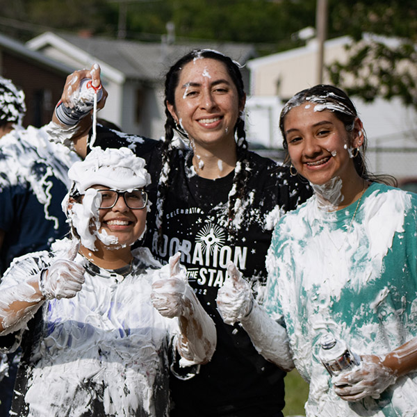 Arguijo (left) and participants of Underground get creative with shaving cream.