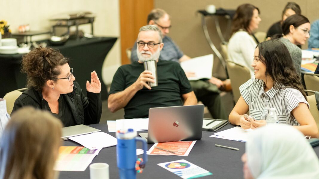 Faculty members gather at an off-campus retreat Sept. 3.