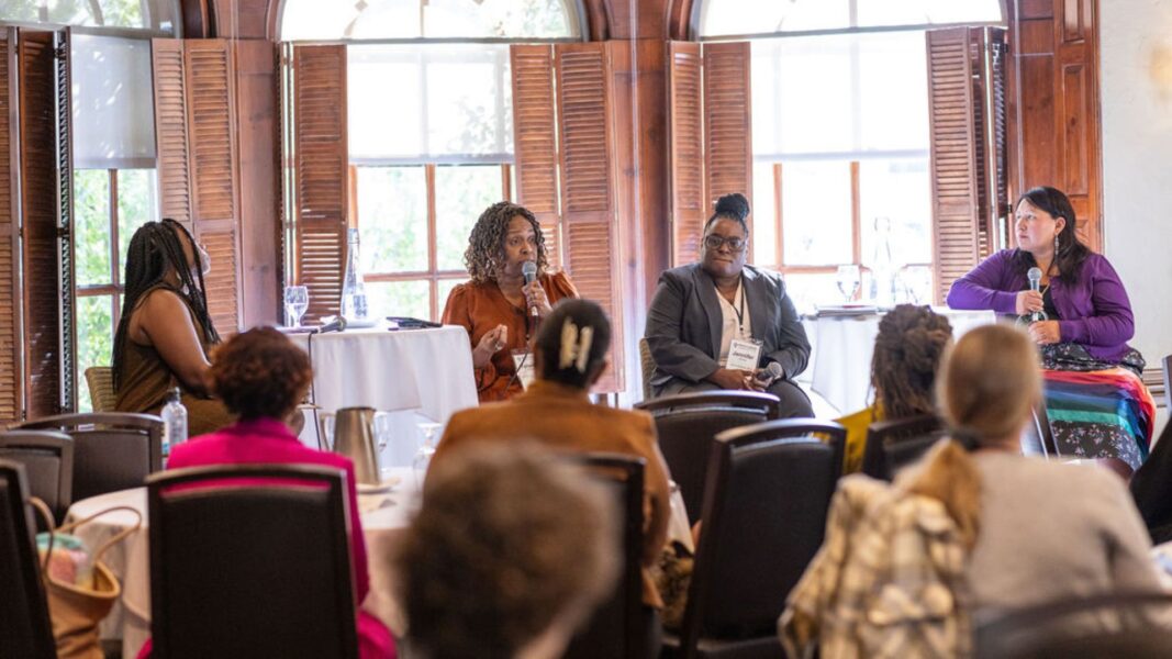 Johnson (center left) speaks during a panel discussion hosted by the National Diversity Congress on Oct. 8.