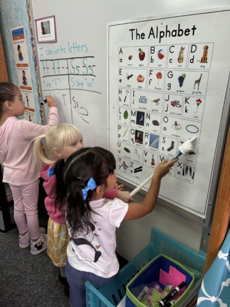 Arellano's students practice hands-on learning in the classroom.