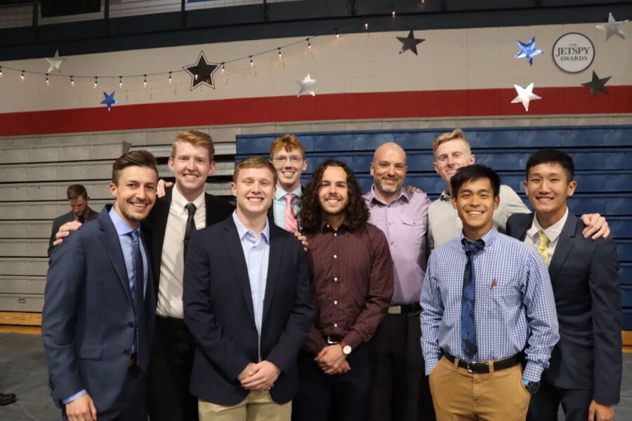 Hall (third from the left) and fellow teammates of the Newman triathlon team attend the annual Jetspy Awards at Newman University.