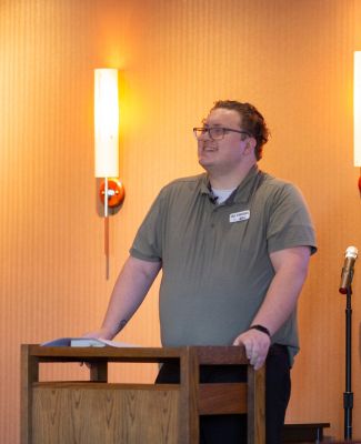 Schneiders leads a discussion in the Newman Tarcisia Roths, ASC, Alumni Center.