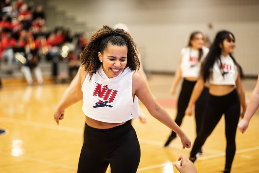 Mwangi performs on the dance team during the 2023 Newman homecoming games.