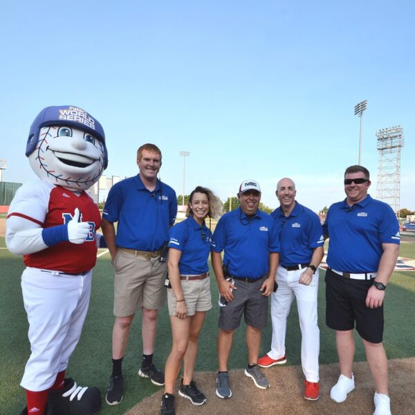 McGowan (center) with staff of the NBC