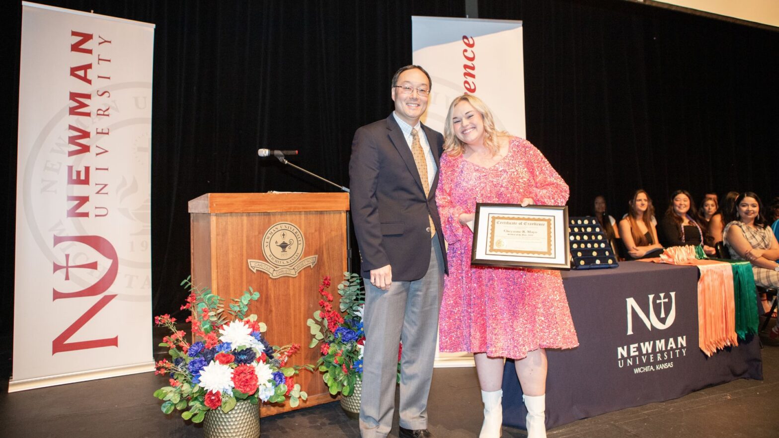 (From left to right) Cho and 2024 outstanding respiratory care graduate recipient Cheyanne Mayo at the School of Healthcare Professions pinning ceremony