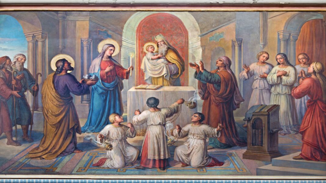 John the Baptist is held as a baby during the presentation in the temple.