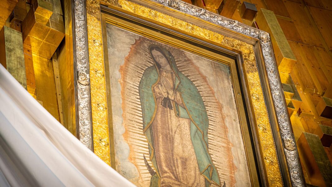 A framed painting of Our Lady of Guadalupe