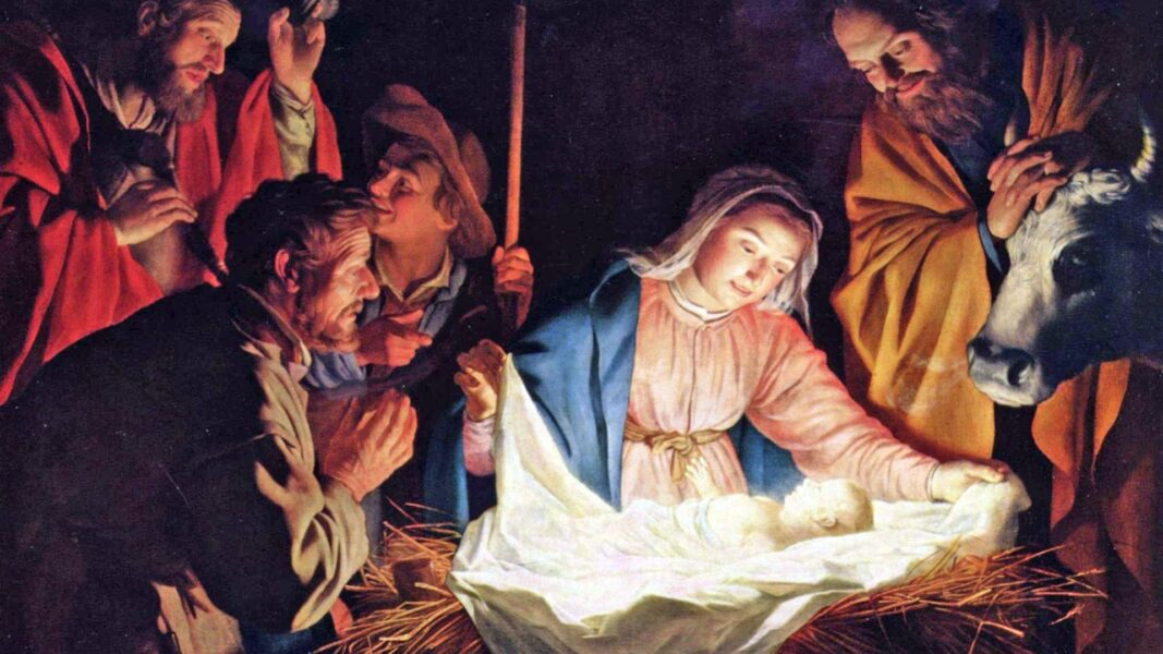 The nativity scene shows a Blessed Virgin Mary looking down upon Jesus, born in a manger, surrounded by Joseph and the three wise men.