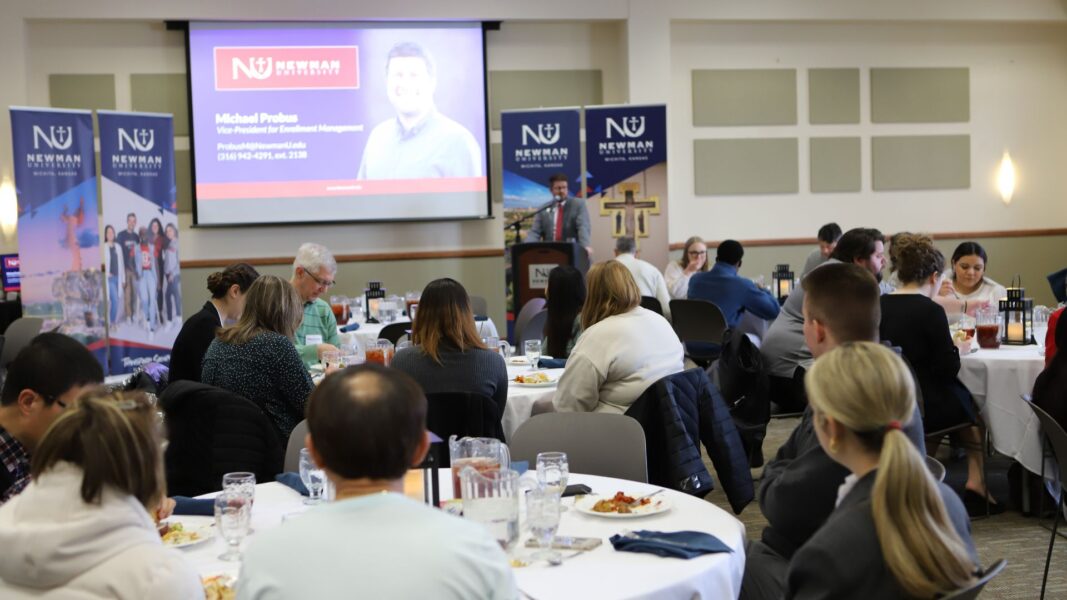 Probus leads an opening prayer and welcome to the student scholarship applicants.