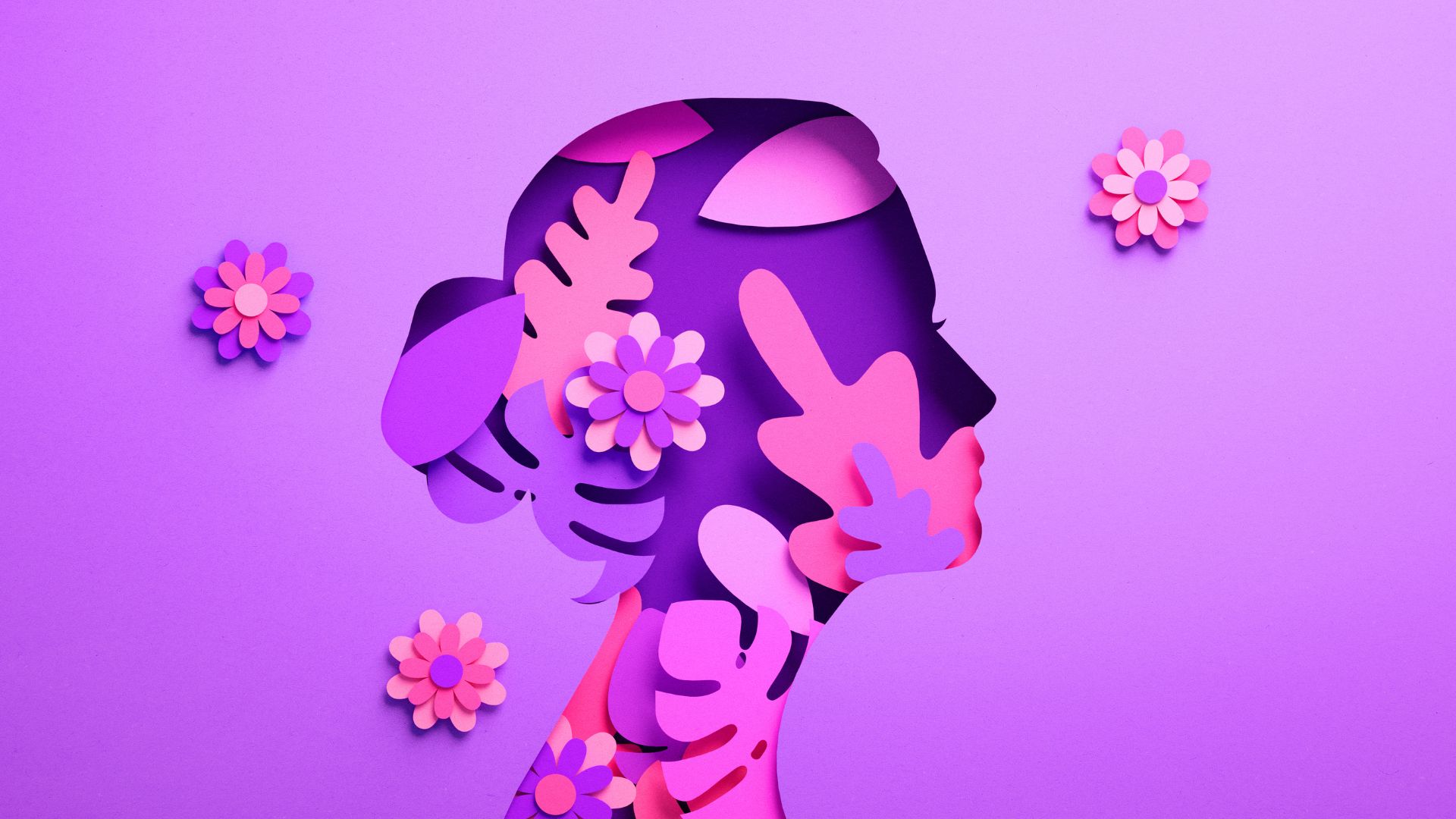 An illustration of a woman with paper flowers decorating her silhouette