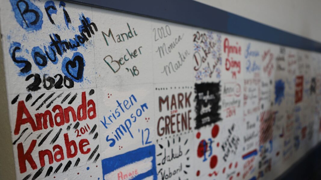 Becker's name can be found painted on the wall in the Honors Lounge at Newman University, a tradition for graduates of the program.