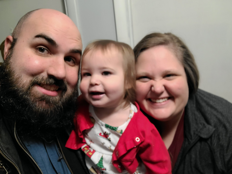 Evans with her husband and daughter