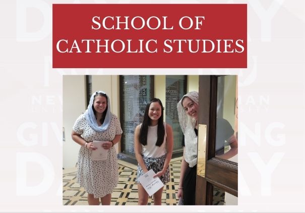 Three students smile as they hold the door open to St. John's Chapel.