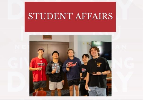 Five male students enjoy treats and smile in the Student Activities Center.