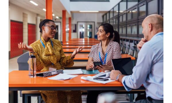 Teachers Collaborating in a school study space