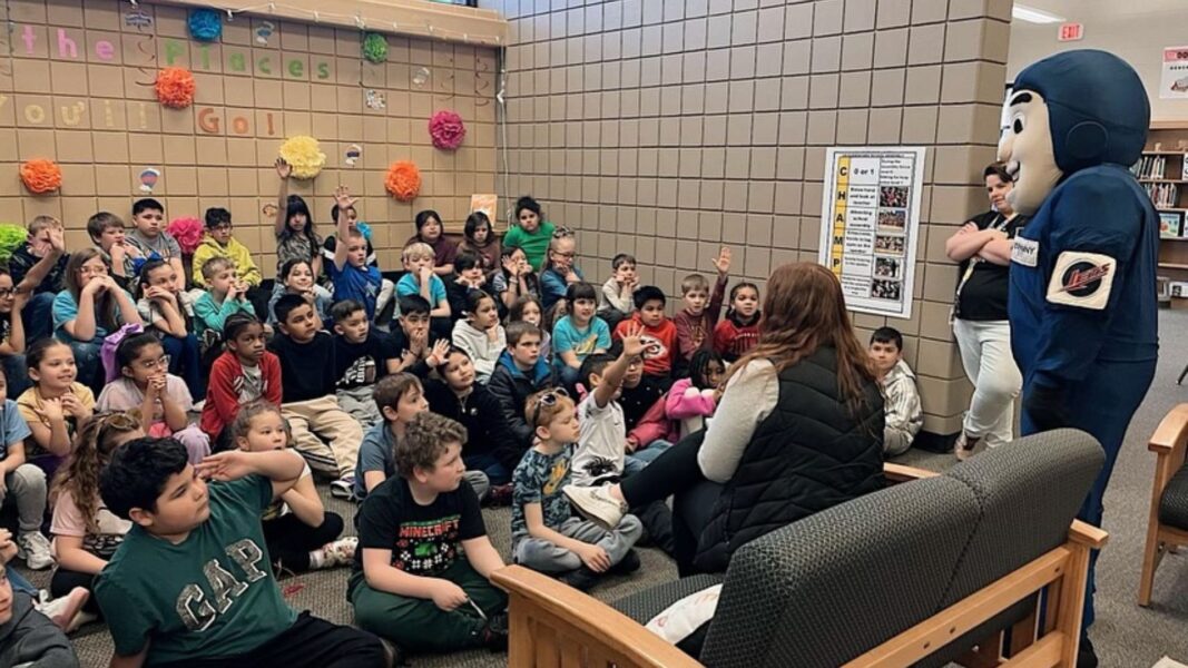 Allie Johnson and Johnny Jet visit students of OK Elementary School in WIchita.