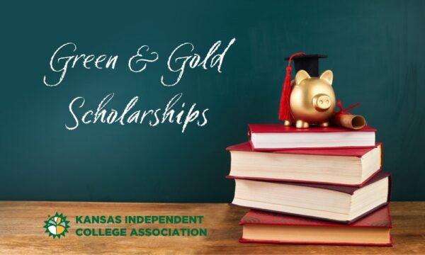 chalkboard behind a table with book on it. piggy bank on top of books