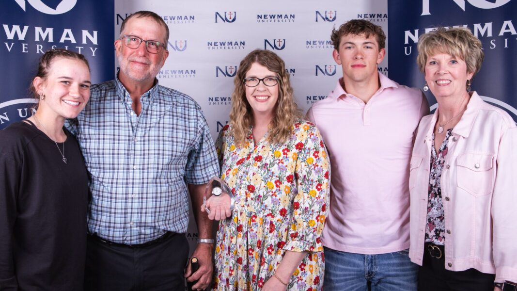 Lies (center) with her children and parents
