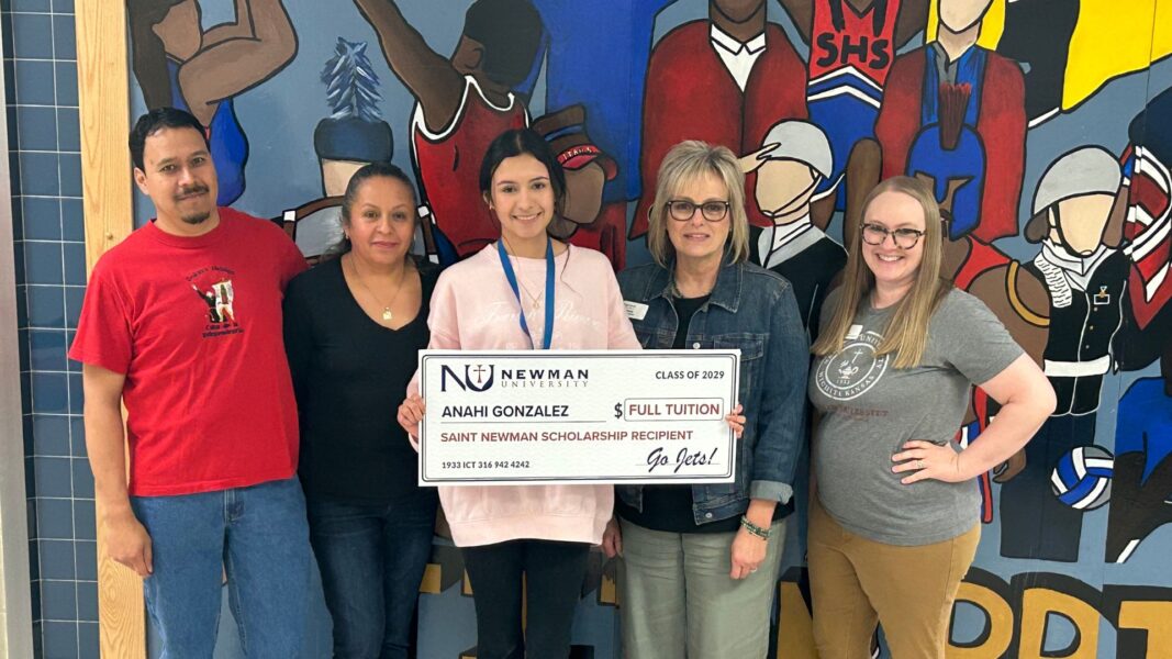 (From left to right) Gonzalez' parents, Gonzalez, Newman admissions counselor Lori Doyle and Senior Associate Director of Admissions Georgia Drewes