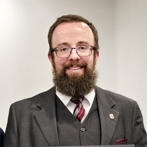 (From left to right) Bell, Brungardt and McCoy with their faculty excellence awards