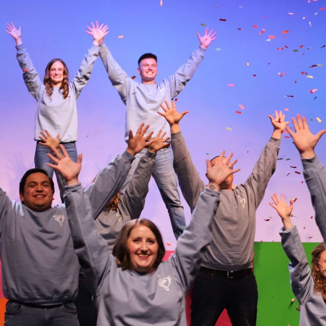 (Back row, left) Erika and Isaac performed in the Newman Family Reunion Spring Musical in May.