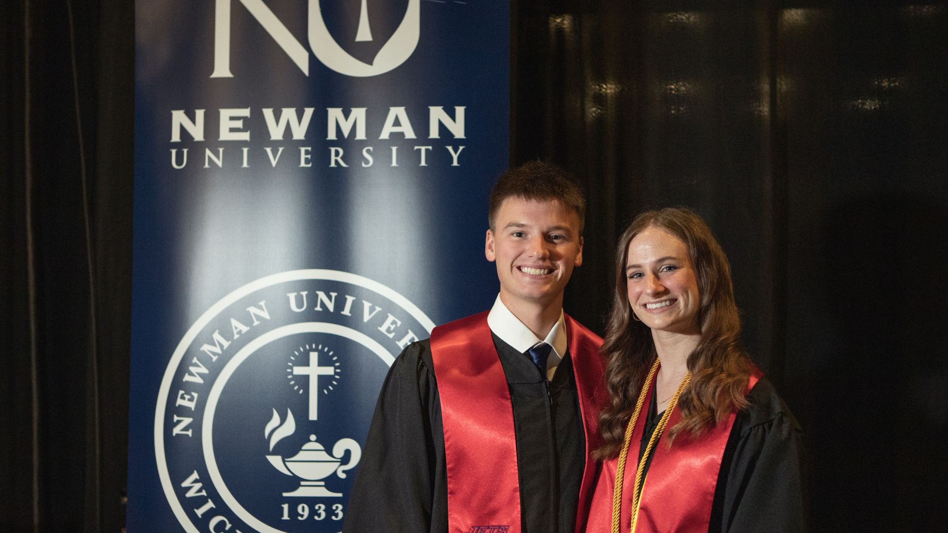 Isaac and Erika Iseman on Newman University commencement day