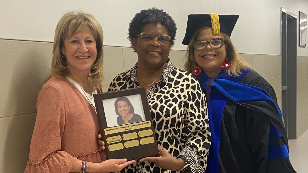 (From left to right) Camarena, Sharpe and principal of Holy Savior Catholic Academy Delia Shropshire hold the Bernie’s Math Power Hour Annual Scholarship plaque at Holy Savior Catholic Academy. 
