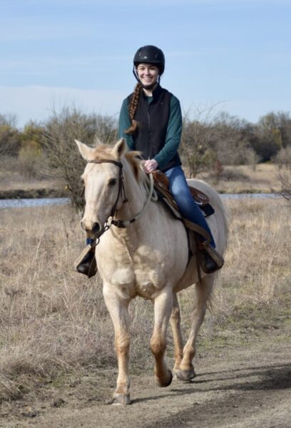 Strickbine rides horseback