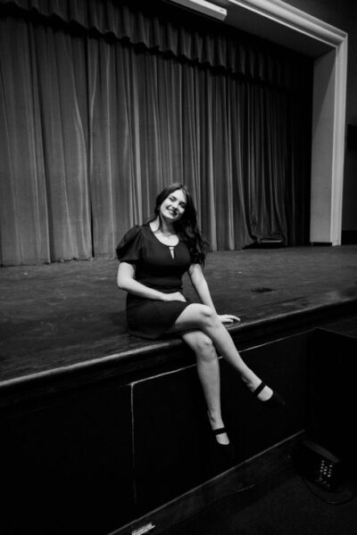 Brown on her high school's stage