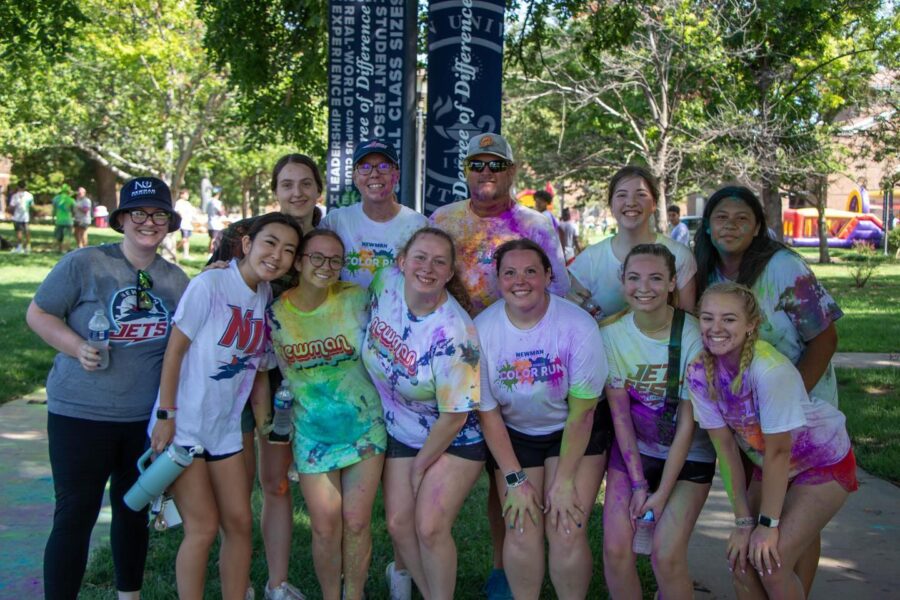 Takeuchi (second from the left) with bowling teammates and coach Murphy (back row, third from the right) at Newman's Color Run.