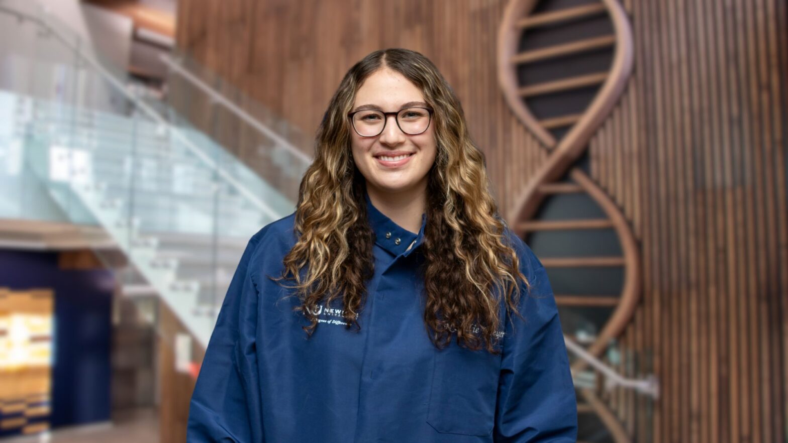 Meyer wears her lab coat in the Bishop Gerber Science Center at Newman University.