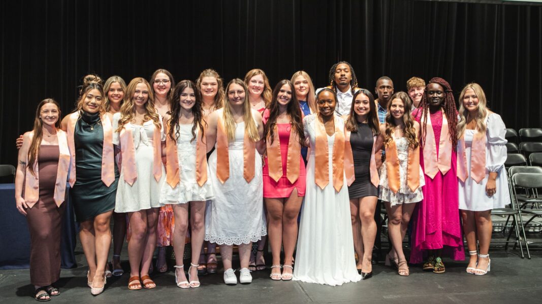 Szewczyk (front row, fourth from right) with her fellow Newman nursing graduates