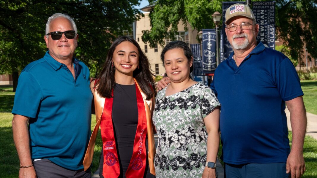 Szewczyk with family members on the Newman University campus