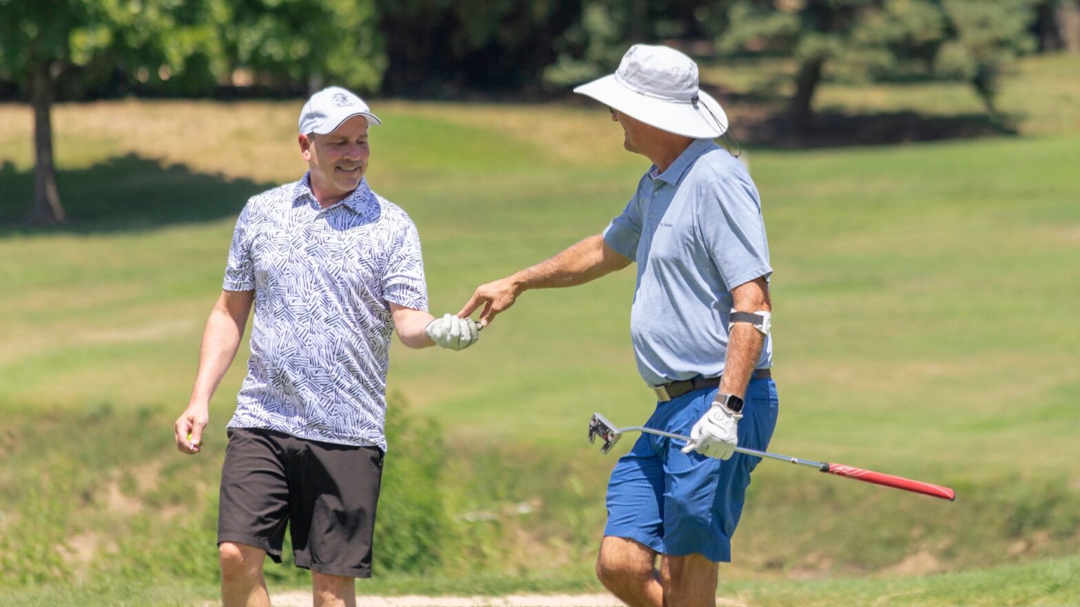 Two golfers at Rolling Hills Country Club at the 2024 Jet Open
