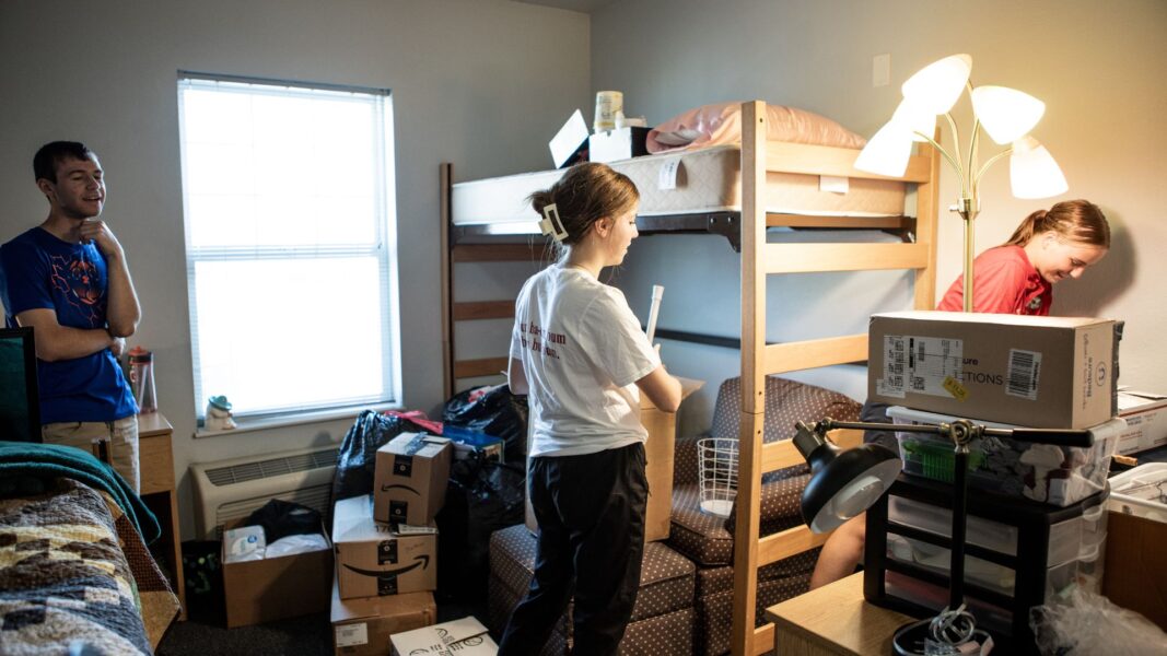 Students settle into their new on-campus home during student move-in day.
