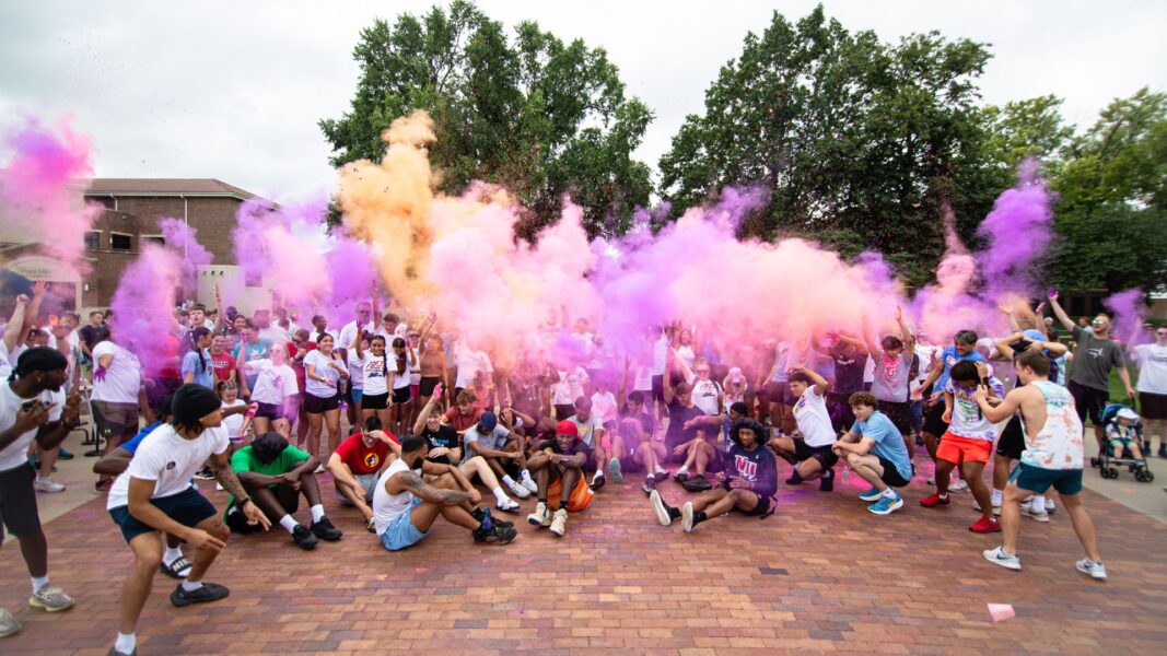 Colors fill the air before the start of the Color Run 5k.